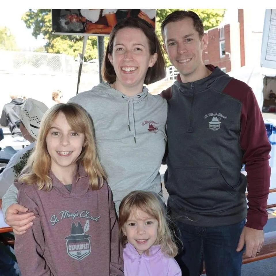 Parish friends smiling together at Oktoberfest